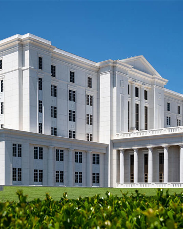 Landscaped lawn and entrance at an institutional building