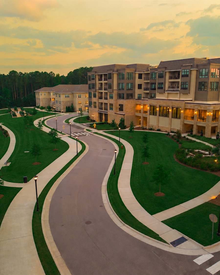 Landscaped walking paths and grounds at a senior living community