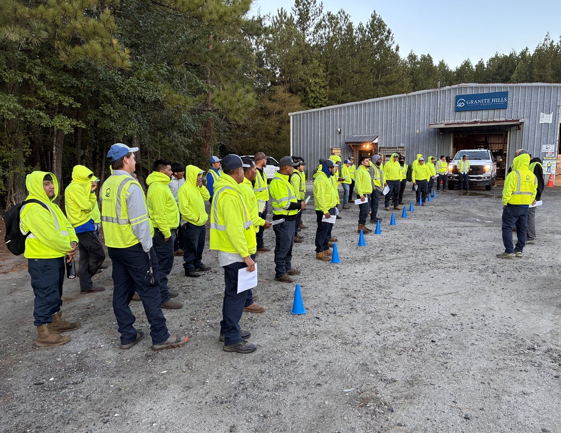 Granite Hills Triangle crew members lined up for a morning briefing outside the branch